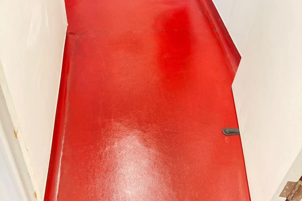 The same corridor floor bright and even after the clean